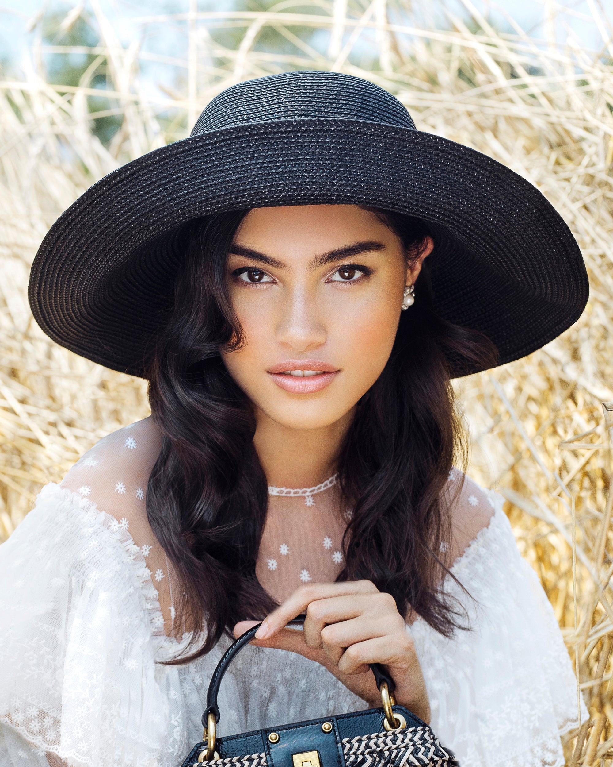 how to style engagement rings with hats