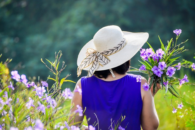 A fashion model wearing a wide-brimmed hat