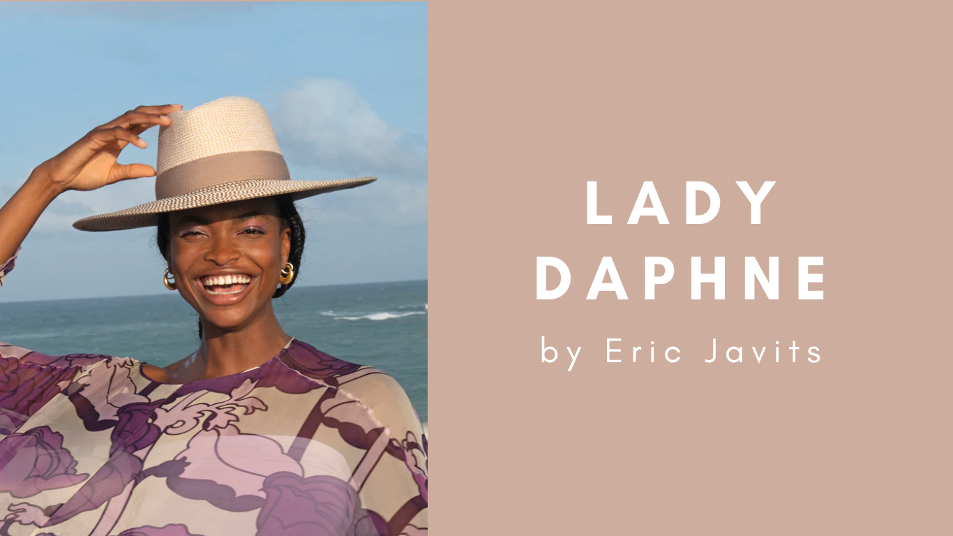 Woman wearing UPF50+ sun protection hat at the beach