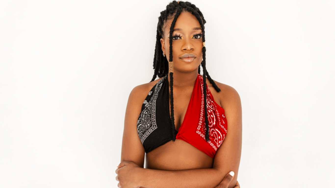 woman wearing a bandana hat like a shirt