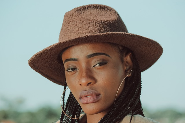 A fashion model wearing a hat