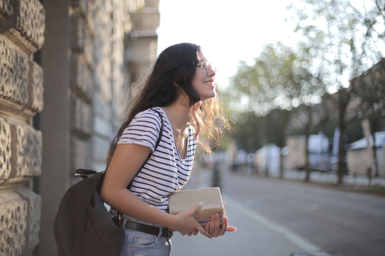 woman carrying a backpack