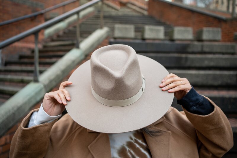woman wearing a hat