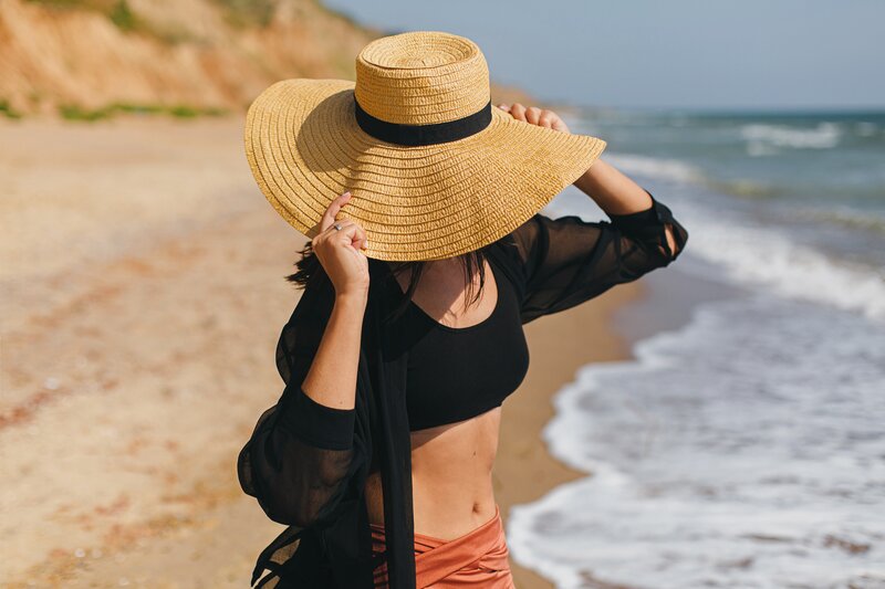 woman wearing a hat