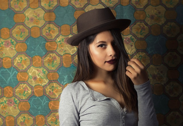 A fashion model wearing a hat