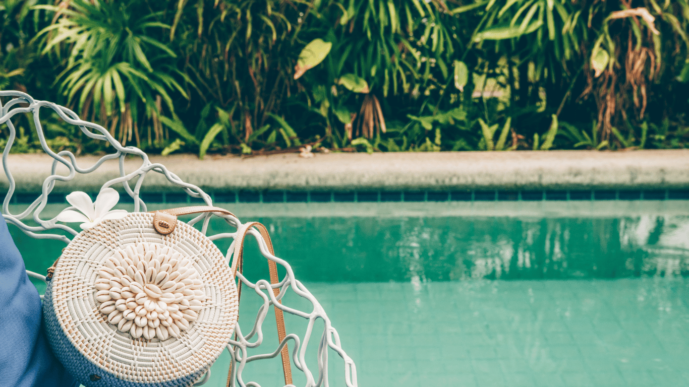 a bag beside the swimming pool